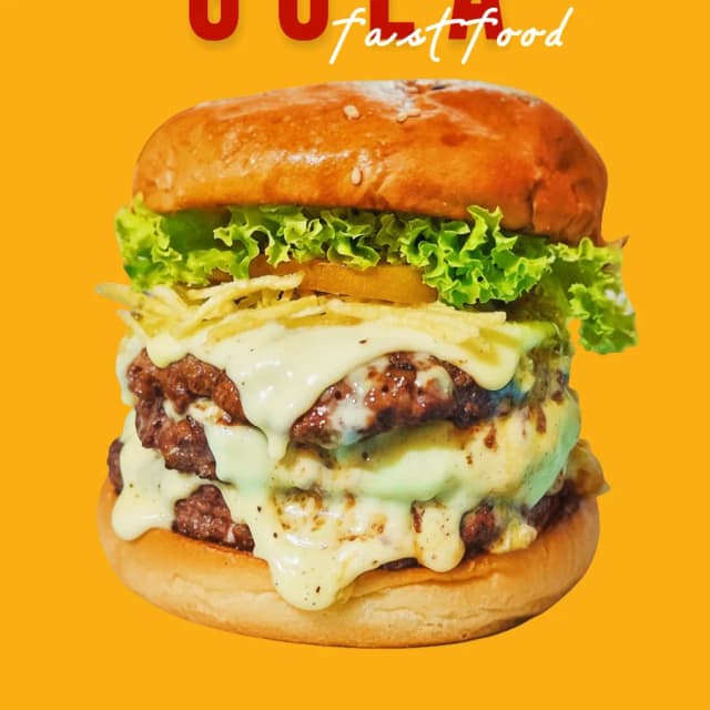 Hamburguesa triple con queso derretido de Gula